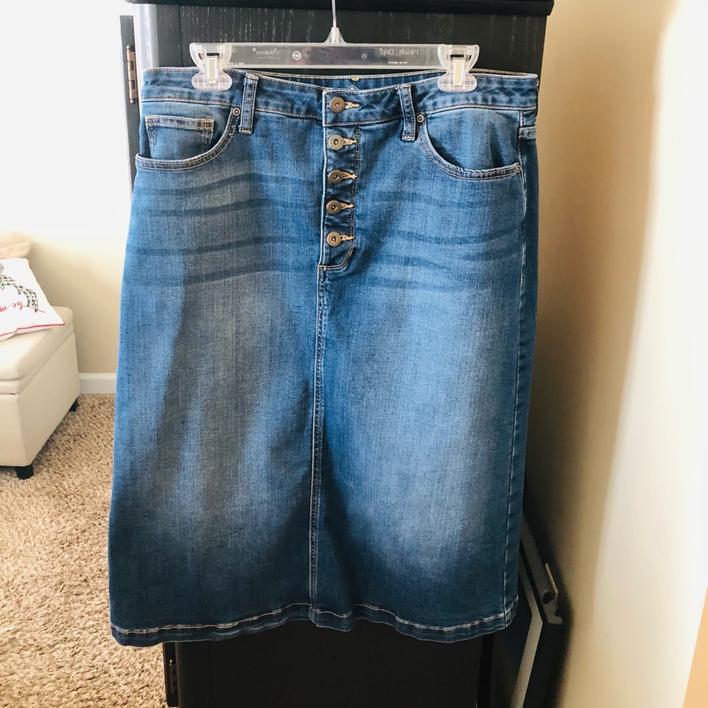 Denim Skirt below knee. Very good condition. Button front